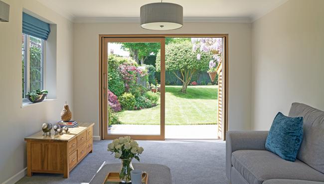 The new Integrated Sliding Door has a frameless fixed panel for uninterrupted views